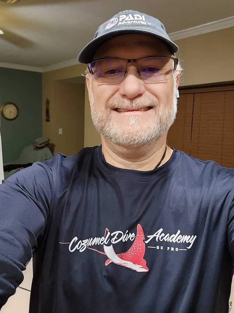 Cozumel Dive Academy custom apparel project photographed on a model