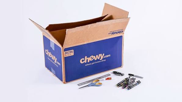 Clean reused Chewy shipping box prepared for another shipment