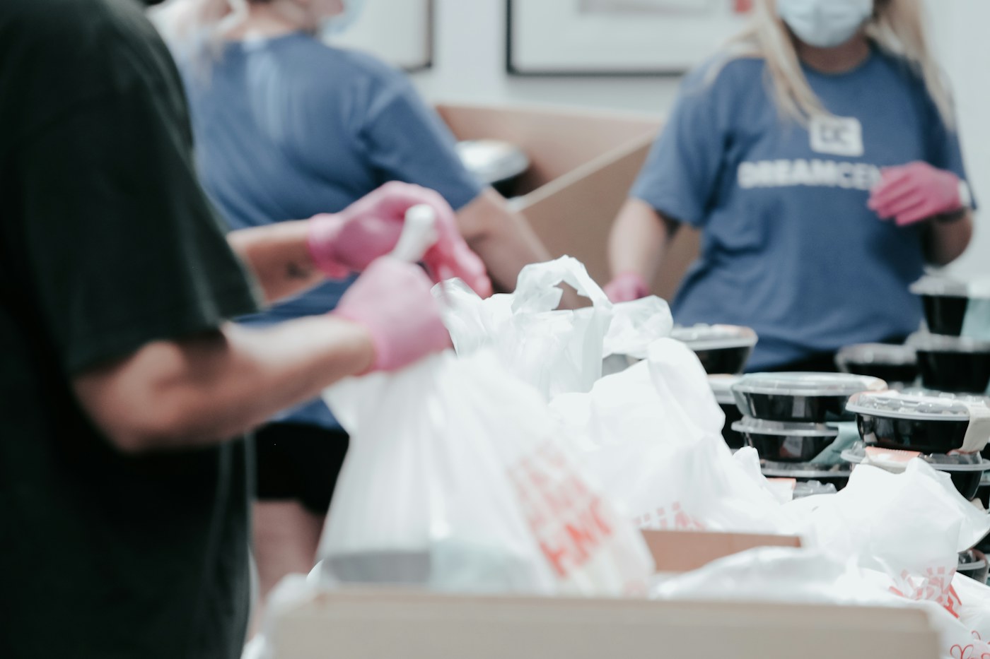 Volunteer team packing food donations during a community service event