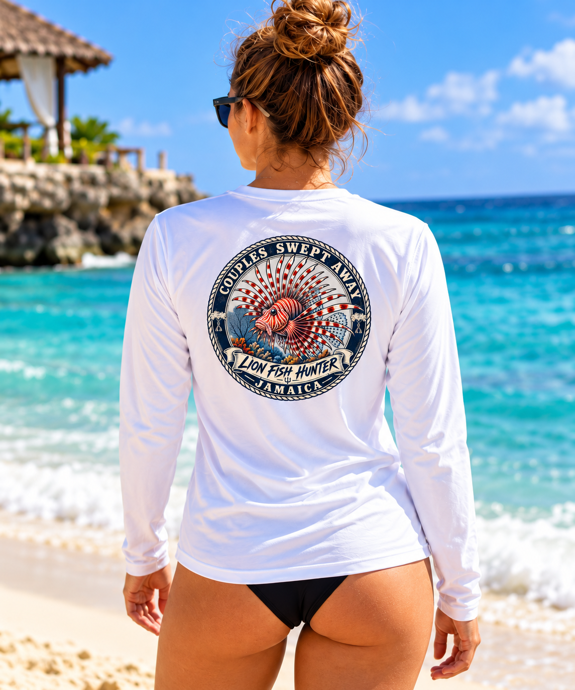 Back of Couples Swept Away Jamaican Dive Team long-sleeve performance shirt featuring Lion Fish Hunter artwork